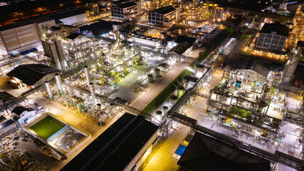 Close-Up of Refinery Pipes and Machinery