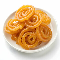 Fototapeta premium Sweet Jalebi Indian dessert in bowl orange spiral treat