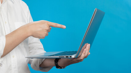 Confident young businessman in white shirt standing typing on laptop in various emotions