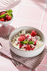 cottage cheese with raspberries and almond petals
