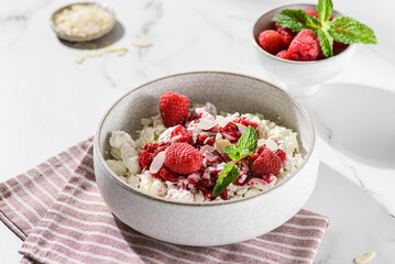 cottage cheese with raspberries and almond petals