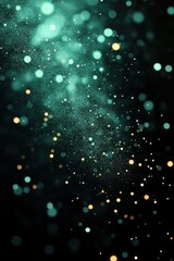 Beautiful abstract background featuring colorful bokeh lights with sparkling effects in teal and gold tones