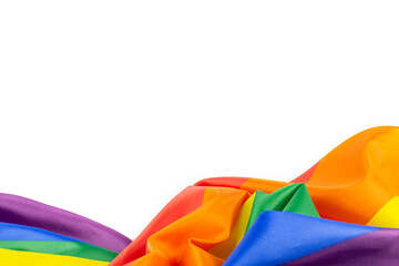 Colorful rainbow ribbon flag on white background. Concept of cheering LGBT communities all over the world
