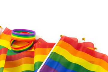 Colorful rainbow ribbon flag on white background. Concept of cheering LGBT communities all over the world