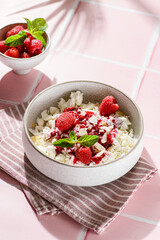 cottage cheese with raspberries and almond petals