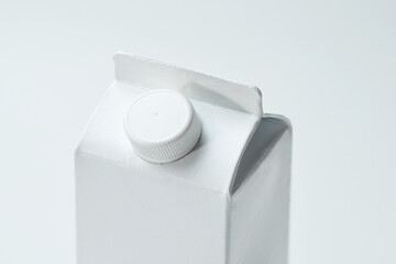 White Milk Carton With Screw Cap, Isolated on Plain Background Showcasing Simple Packaging Design