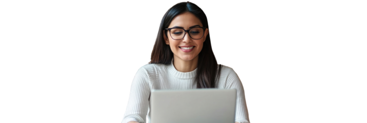 Smiling woman works on laptop in cozy environment during day, showcasing focus and enjoyment of her task