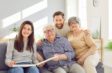 Family in love, aging parents and adult children, old and youth together group portrait. Elderly mother, father, grandmother, grandfather loving kind affection, trust, family peace, generation harmony