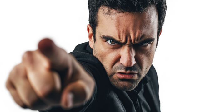 Man with fierce and serious character with angry expression and pointing finger at camera isolated on transparent background
