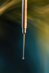 A detailed view of a needle with a blurred background