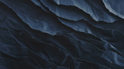 Obraz premium Abstract concept of black rumpled paper texture for creative design and background