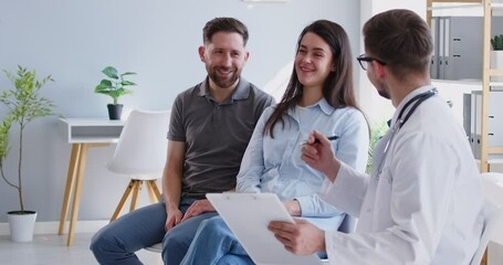 Happy family couple during a consultation with a gynecologist doctor, discussing pregnancy planning or ivf. They are at the hospital seeking advice and assistance with family planning journey. - Powered by Adobe