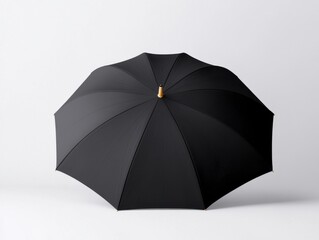 Umbrella mockup A sleek black umbrella with a golden tip, displayed against a minimalist white background, exuding elegance and functionality.