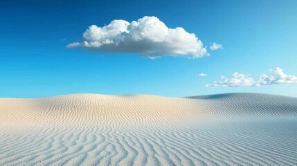 Fototapeta premium Serene Desert Sand Dunes Under a Clear Blue Sky with Soft White Clouds in the Distance