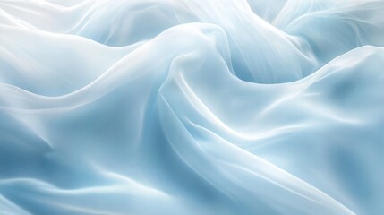 Fototapeta premium Delicate blue sheer fabric flowing softly, creating an ethereal and serene atmosphere.