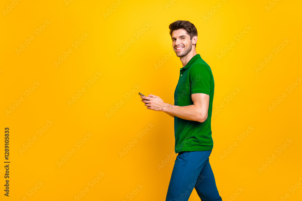 Poster profile side view portrait of his he nice attractive cheerful cheery glad content guy using device s