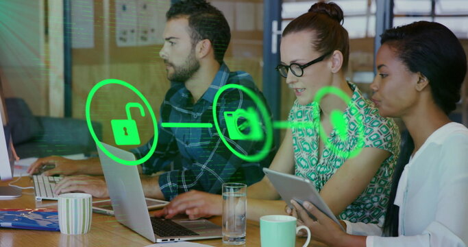 Image of network of connections with icons over diverse colleagues working in office