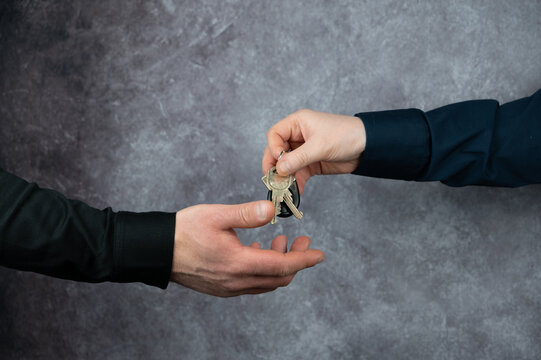 Handing Over House Keys for New Ownership