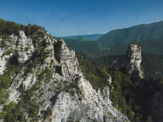 sheer cliffs, rock massif Sairme pillars in Georgia in caucasus, aerial view