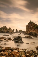 Landscape and seascape of rocky beach at Shark Tooth Beach Kelumbayan Lampung