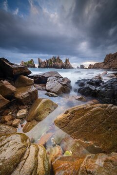 Landscape and seascape of rocky beach at Shark Tooth Beach Kelumbayan Lampung