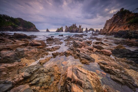 Landscape and seascape of rocky beach at Shark Tooth Beach Kelumbayan Lampung