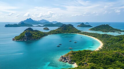 Top-down perspective of the peaceful southern Thai sea with turquoise waters, scattered islands, and sandy beaches.