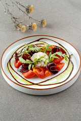 Red peppers, beets, laid out on a platter as an appetizer with horseradish.