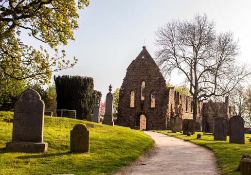 The ruins of the Beauly Priory, situated in the graveyard of the small town of Beauly in the Scottish Highlands, early on a clear sunny morning