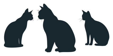 Three Sitting Cat Silhouettes in Different Poses