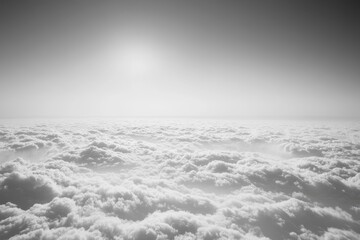 Obraz premium A black and white photograph capturing the expanse of clouds in the sky Monochromatic representation of a cloudy sky .
