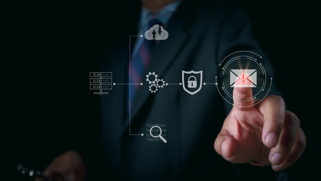 Email Security Warning Notification Concept. A businessman interacting with a digital screen showing email security alerts and warning notifications, cybersecurity threats. spam virus, junk mail, scam