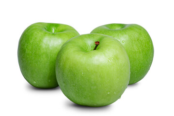 Three green apples with water drops isolated.