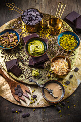 Ingredients for homemade Dubai chocolate  on wooden table