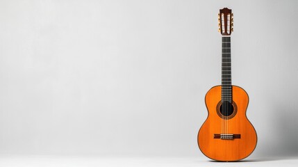 Fototapeta premium Classical guitar on white background; music, hobby