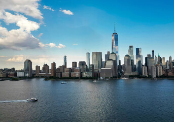 Obraz premium NYC skyline with skyscrapers aerial view. Manhattan and Brooklyn. New York City skyline with Hudson River views. Downtown NYC. New York from waterfront skyline. Panorama of of New York from top.