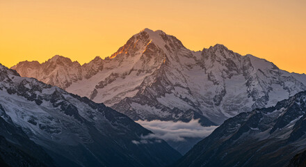Golden Hour's Embrace on Majestic Peaks