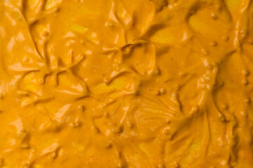 Yellow sauce splashes as a background.