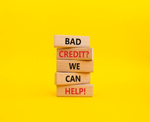 Bad credit We can Help symbol. Wooden blocks with words Bad credit We can Help. Beautiful yellow background. Business and Bad credit We can Help concept. Copy space.