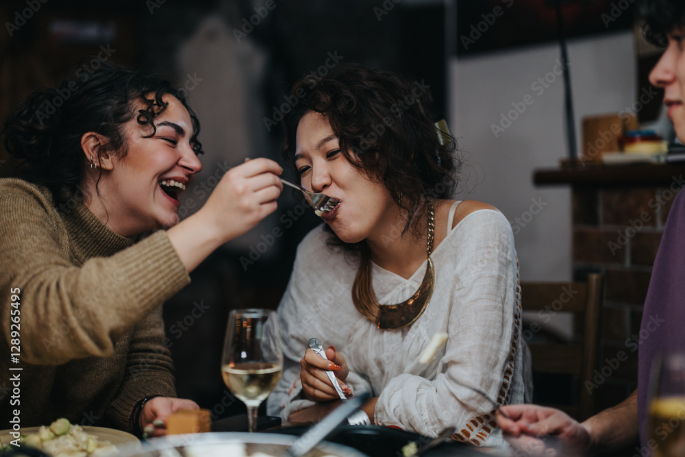 Poster A group of friends experiences a joyful dinner, sharing food, laughter, and good times. The scene portrays warmth, community, and the happiness of being together at a dining table.