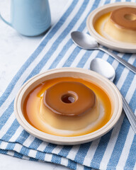 Traditional brazilian condensed milk pudding with caramel syrup