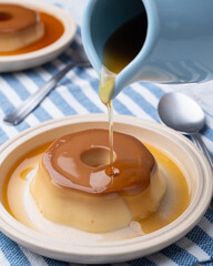 Traditional brazilian condensed milk pudding with caramel syrup