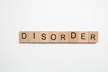 Disorder on wooden tiles on white background 
