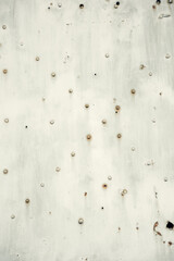 A textured close-up of a weathered metal surface with rusted rivets and signs of aging. Ideal for...