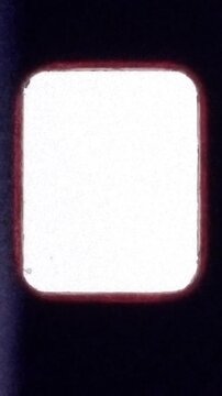 Vintage Super 8 Film Frame with Soft Light Leaks Along Edges. Authentic Analog Texture for Creative Compositing in Vertical Video and Nostalgic Visual Design. FL0058
