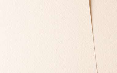 Off-white and beige paper with embossed dotted texture and perforated pattern. Elegant, artistic...