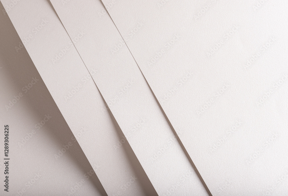 Poster pearl, off-white, and beige paper with metallic shimmer and smooth texture. layered, folded design w