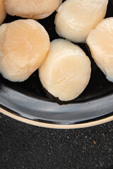 sea scallop raw seafood fresh tasty food dish delicious gourmet food background on the table rustic food top view copy space pescetarian diet