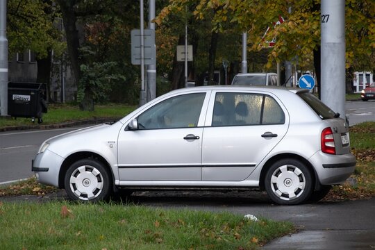 Silver Czech Skoda Fabia Classic hatchback car with 15-inch wheels parked on street