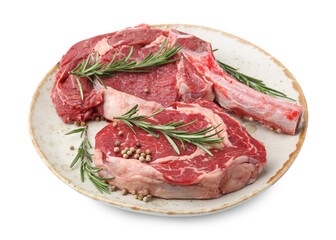 Pieces of raw beef meat and spices isolated on white